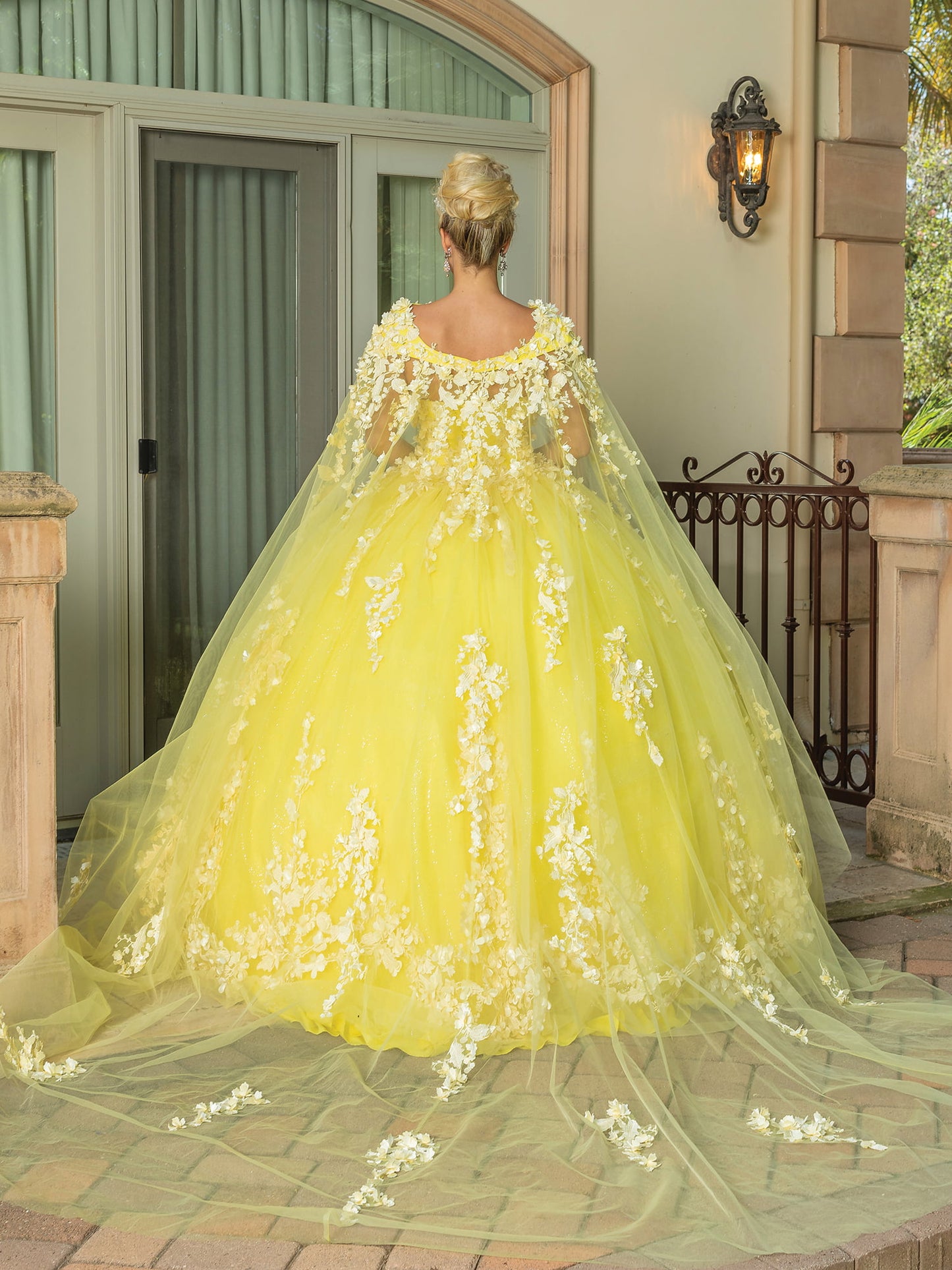 DQ25-1725 STRAPLESS GOWN WITH FLORAL APPLIQUES AND LAYERED TULLE SKIRT