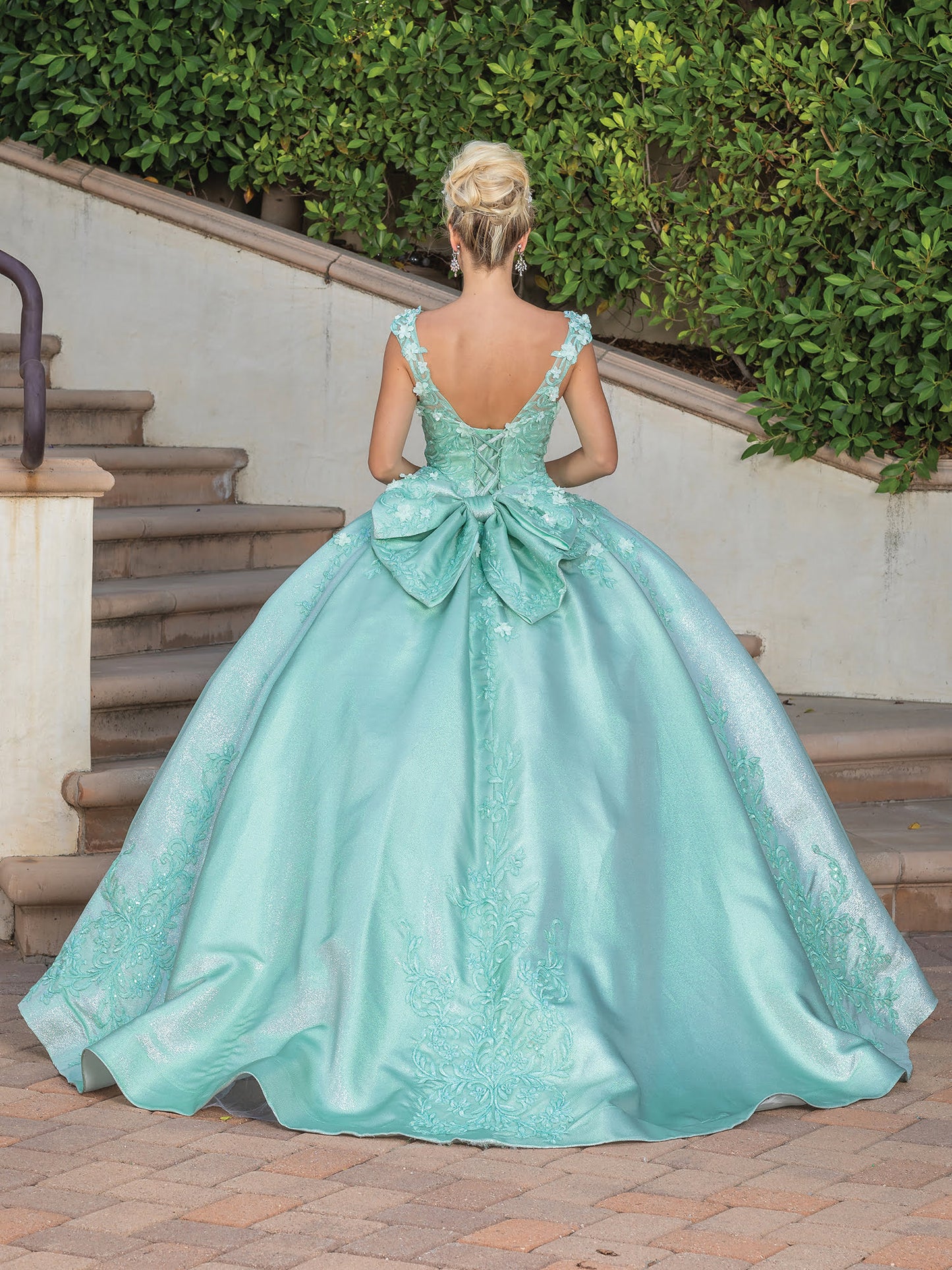 DQ25-1762 SOPHISTICATED V-BACK GOWN WITH LACE EMBELLISHMENT AND OVERSIZED BOW DETAIL